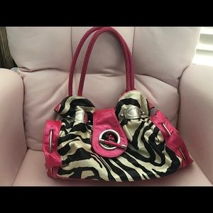 Pink, black, and white zebra purse.
